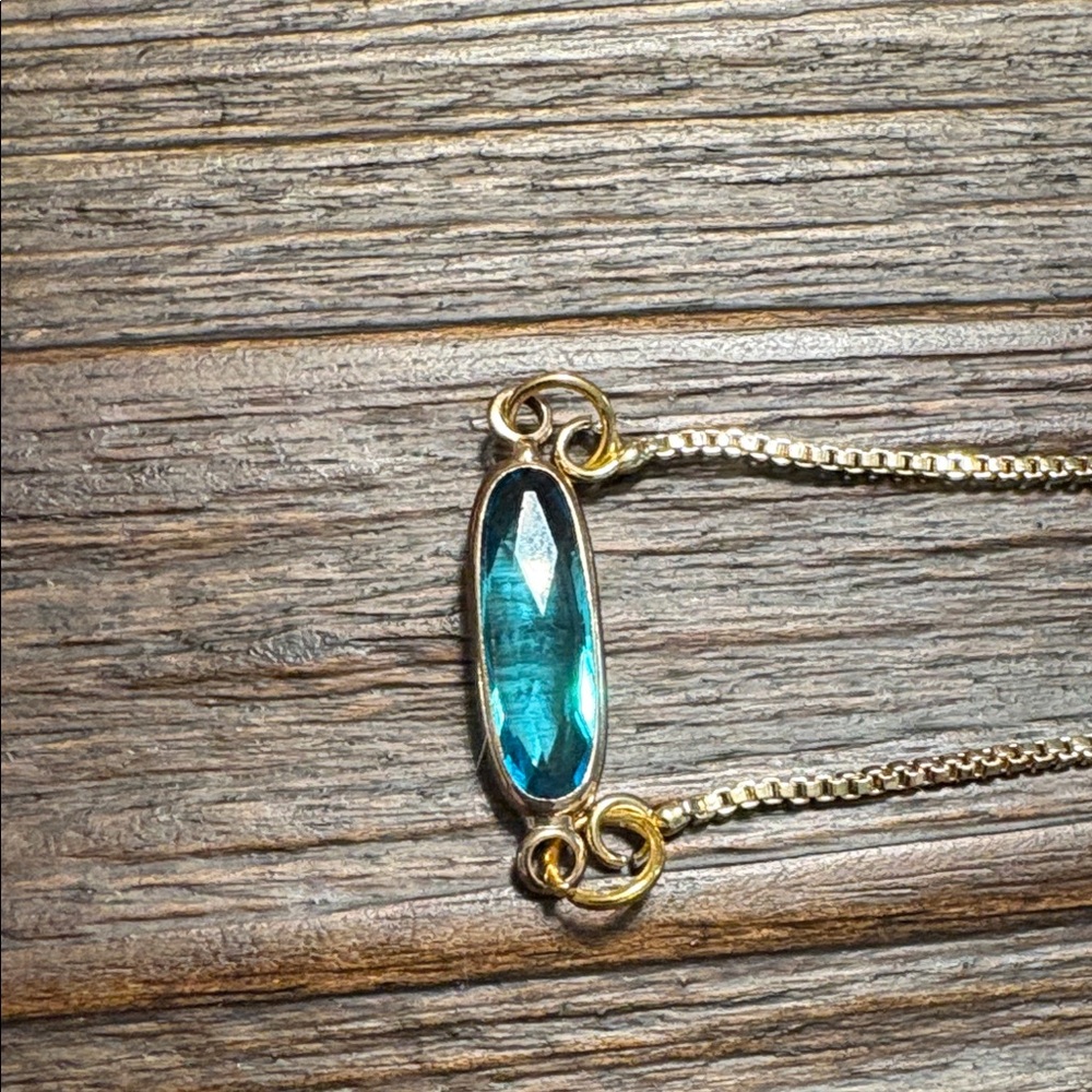 Elegant Gold and Blue Bracelet